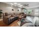 Comfortable living room with hardwood floors, cozy furniture, natural light, and stylish decor for relaxation and entertainment at 708 Egret Ct, Edgewater, FL 32141