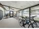 The sunroom has a ceiling fan and plenty of windows to let in the sunlight at 708 Egret Ct, Edgewater, FL 32141