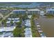 Picturesque waterfront condo community with boat docks and beautiful landscaping offers a serene and vibrant coastal lifestyle at 76 Heather Point Ct, New Smyrna Beach, FL 32169