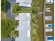 Aerial view of the property, showcasing the homes and docks along the water at 76 Heather Point Ct, New Smyrna Beach, FL 32169