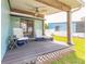 Relaxing back porch with comfortable seating, perfect for enjoying the outdoors at 76 Heather Point Ct, New Smyrna Beach, FL 32169