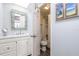 Well-lit bathroom with a shower and tub at 76 Heather Point Ct, New Smyrna Beach, FL 32169