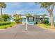 Well-maintained villa with dedicated guest parking and lush, tropical landscaping at 76 Heather Point Ct, New Smyrna Beach, FL 32169
