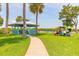 Community gazebo and kayak rack are surrounded by lush landscaping at 76 Heather Point Ct, New Smyrna Beach, FL 32169