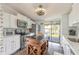 Well-equipped kitchen featuring stainless steel appliances, a center island, and access to the deck at 76 Heather Point Ct, New Smyrna Beach, FL 32169