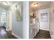 Convenient laundry area with modern appliances, ample storage space, and stylish flooring at 76 Heather Point Ct, New Smyrna Beach, FL 32169