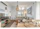 Cozy living area with coastal decor, complemented by a comfortable sofa and stylish furnishings at 76 Heather Point Ct, New Smyrna Beach, FL 32169