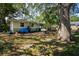 Spacious backyard area with a patio and lush greenery at 804 E 12Th Ave, New Smyrna Beach, FL 32169