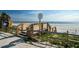 Wooden beach access walkway leads to a stunning view of the ocean at 804 E 12Th Ave, New Smyrna Beach, FL 32169
