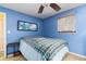 Bedroom featuring blue walls and a comfortable bed at 804 E 12Th Ave, New Smyrna Beach, FL 32169
