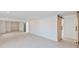 Spacious basement with ample room for customization and features a modern barn door at 833 E 12Th Ave, New Smyrna Beach, FL 32169