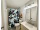 Bathroom featuring mosaic tile backsplash, and shower with novelty shower curtain at 84 Heather Point Ct, New Smyrna Beach, FL 32169