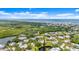 Scenic aerial view showcasing the community's proximity to the ocean and local waterways at 94 Cedar Dunes Dr, New Smyrna Beach, FL 32169