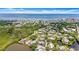 Panoramic aerial view highlights neighborhood near ocean at 94 Cedar Dunes Dr, New Smyrna Beach, FL 32169