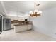 Kitchen with stainless steel appliances and tiled flooring at 94 Cedar Dunes Dr, New Smyrna Beach, FL 32169