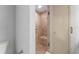 Walk-in shower with built-in seating and glass door at 94 Cedar Dunes Dr, New Smyrna Beach, FL 32169