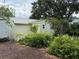 View of shed with beautiful garden at 125 Rio Vista Dr, Edgewater, FL 32132