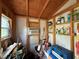 Interior of shed, featuring shelving and air conditioning unit at 125 Rio Vista Dr, Edgewater, FL 32132