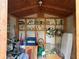 Interior of shed, stocked with various supplies and seasonal decor at 125 Rio Vista Dr, Edgewater, FL 32132