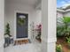 Welcoming front porch with stylish decor and a charming entrance, perfect for guests at 1290 9Th St, Orange City, FL 32763