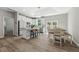 Bright, spacious kitchen with white cabinets, an island with seating, and stainless steel appliances at 1290 9Th St, Orange City, FL 32763