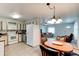 Open-concept kitchen and dining area perfect for entertaining and Gathering gatherings at 130 N Gaines St, Oak Hill, FL 32759