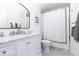 Stylish bathroom with a white vanity, modern fixtures, and a shower with elegant tile at 1327 Wayne Ave, New Smyrna Beach, FL 32168
