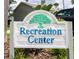 Close-up of the Recreation Center sign, welcoming residents to community amenities and activities at 1327 Wayne Ave, New Smyrna Beach, FL 32168