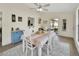Bright dining room featuring backyard views, and a modern ceiling fan at 1382 Coronet Dr, Deltona, FL 32725