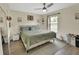 Tranquil main bedroom with calming color palette, ceiling fan, and generous natural light at 1382 Coronet Dr, Deltona, FL 32725