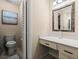 Bathroom with a white vanity, drawer, and enclosed toilet and shower space at 140 Limewood Pl # C, Ormond Beach, FL 32174