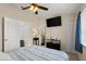 Bright bedroom featuring a ceiling fan, cozy carpet, natural light and modern decor for a peaceful retreat at 140 Limewood Pl # C, Ormond Beach, FL 32174
