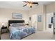 An additional view of the bedroom with coastal decor at 140 Limewood Pl # C, Ormond Beach, FL 32174