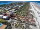 Aerial view of the property showing its proximity to the beach and surrounding landscape at 1421 N Atlantic Ave, New Smyrna Beach, FL 32169