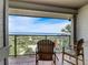 Relaxing balcony showcasing outdoor seating and stunning views of the ocean and beach at 1421 N Atlantic Ave, New Smyrna Beach, FL 32169