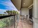 Tranquil balcony featuring comfortable seating and serene views of the ocean and surrounding landscape at 1421 N Atlantic Ave, New Smyrna Beach, FL 32169