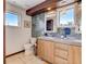 Stylish bathroom with a wood vanity, decorative backsplash, and modern fixtures at 1421 N Atlantic Ave, New Smyrna Beach, FL 32169