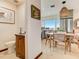 Open kitchen and dining area with modern appliances and a bright, airy feel, complemented by a nearby powder room at 1421 N Atlantic Ave, New Smyrna Beach, FL 32169