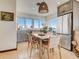 Charming eat-in kitchen with stainless steel appliances, wood cabinets, and lots of natural light at 1421 N Atlantic Ave, New Smyrna Beach, FL 32169