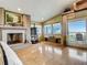 Living room features fireplace, tv, and ocean views at 1421 N Atlantic Ave, New Smyrna Beach, FL 32169