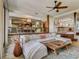 Comfortable living room with open concept to dining and kitchen, and large sectional seating, perfect for entertaining at 1421 N Atlantic Ave, New Smyrna Beach, FL 32169