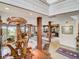 Open living space with unique decor, beams, wood accents, and views of the ocean and dining area at 1421 N Atlantic Ave, New Smyrna Beach, FL 32169
