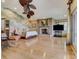 Expansive main bedroom with fireplace and large windows for plenty of natural light at 1421 N Atlantic Ave, New Smyrna Beach, FL 32169