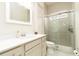 Bathroom featuring a sleek single vanity, walk-in shower, and modern finishes at 150 Portofino Blvd, New Smyrna Beach, FL 32168