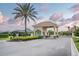 Gated Portofino Reserve community featuring manicured landscaping and controlled access for added security at 150 Portofino Blvd, New Smyrna Beach, FL 32168