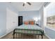 Bedroom featuring light blue paint, natural light from a window, carpet, and closet at 1615 Primo Ct, Holly Hill, FL 32117