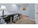 Versatile upstairs bonus room with a desk and plenty of open space at 1615 Primo Ct, Holly Hill, FL 32117