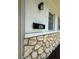 Close-up of stone exterior details with the house number and mailbox at 167 N Hill Ave # 60, Deland, FL 32724