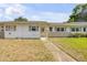 Well-maintained single-story home with stone accents, walkway, and bright, sunny exposure at 167 N Hill Ave # 60, Deland, FL 32724