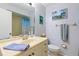 Functional bathroom with vanity, mirror, and coordinated decor at 1723 Needle Palm Dr, Edgewater, FL 32132